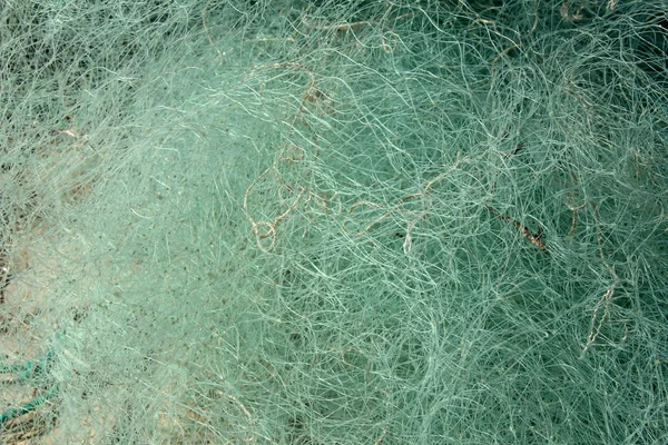 Фон зелених рибальських сіток — стокове фото