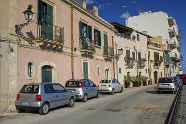 picturesque sea promenade in Ortigia, oldest part of the beautiful baroque city of Syracuse in Sicily, Italy