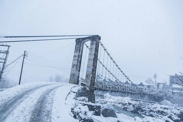 Bridge is covered by layer of snow on a Winter\'s day , Winter snow storm - Image