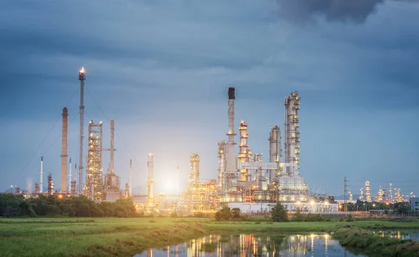 Oil Refinery factory Petroleum at twilight sunset, petrochemical plant