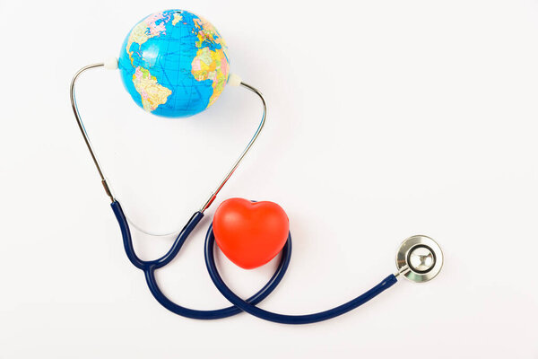 World health day concept, Stethoscope, globe and red heart 