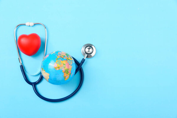 World health day concept, Stethoscope, globe and red heart 
