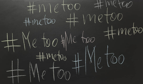 me too written with chalk on blackboard.