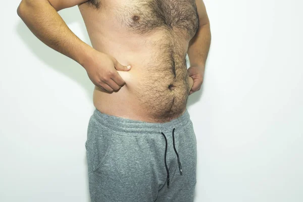 El hombre está en el escenario de la obesidad . — Foto de Stock