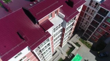 Construction site with a bird's eye in a megacity. New house in a new residential complex. Flying over the construction site. aerial panoramic top view from hight copter drone flying sky footage