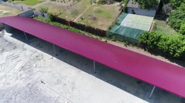 Construction site with a bird's eye in a megacity. New house in a new residential complex. Flying over the construction site. aerial panoramic top view from hight copter drone flying sky footage