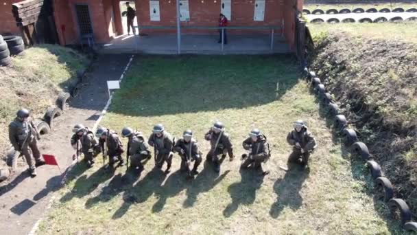 Marine Training Officer Watching Three Trainees Pushups Firing Range — Stock Video