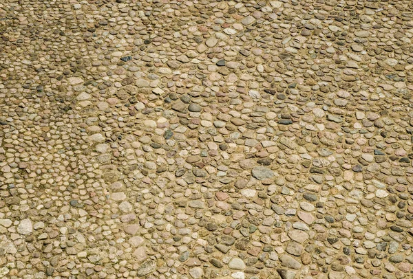 Patroon gemaakt van verschillende stenen — Stockfoto