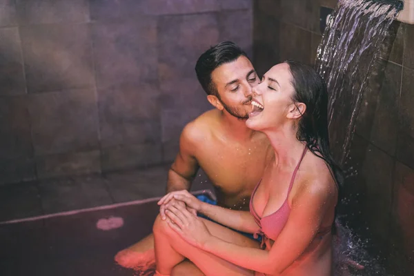 Young Couple Lovers Enjoying Pool Waterfall Hotel Resort Spa Loving — Stock Photo, Image