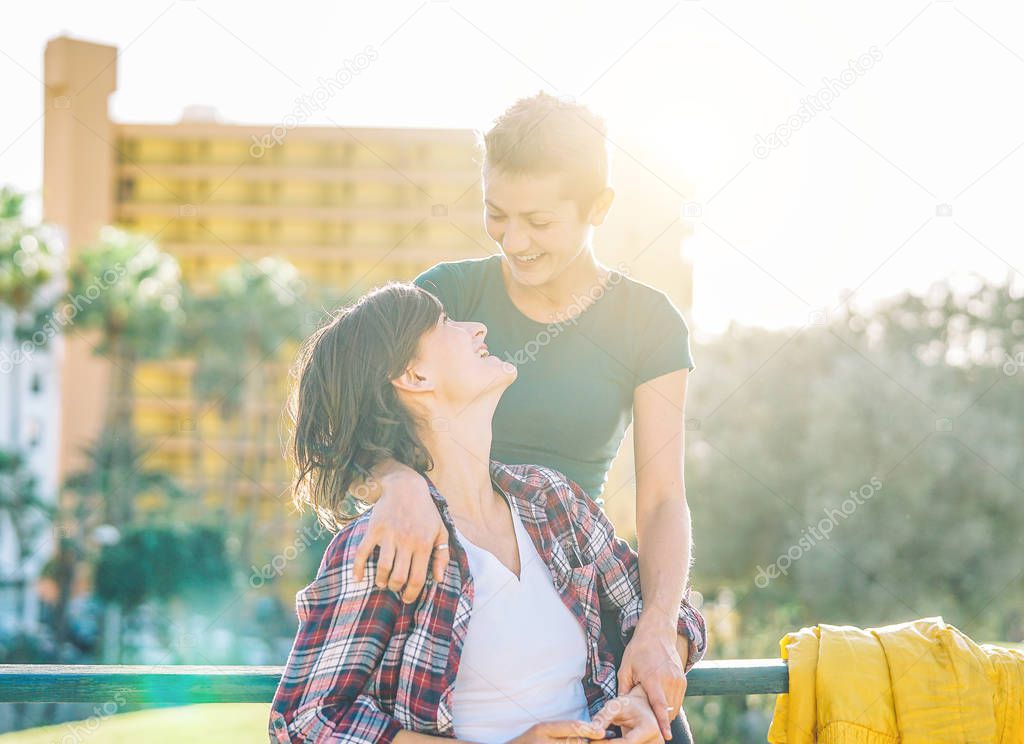 Happy lesbian couple at the beginning of their love story - Two homosexual young women enjoying tender moments together - Lgbt, relationship, lifestyle concept