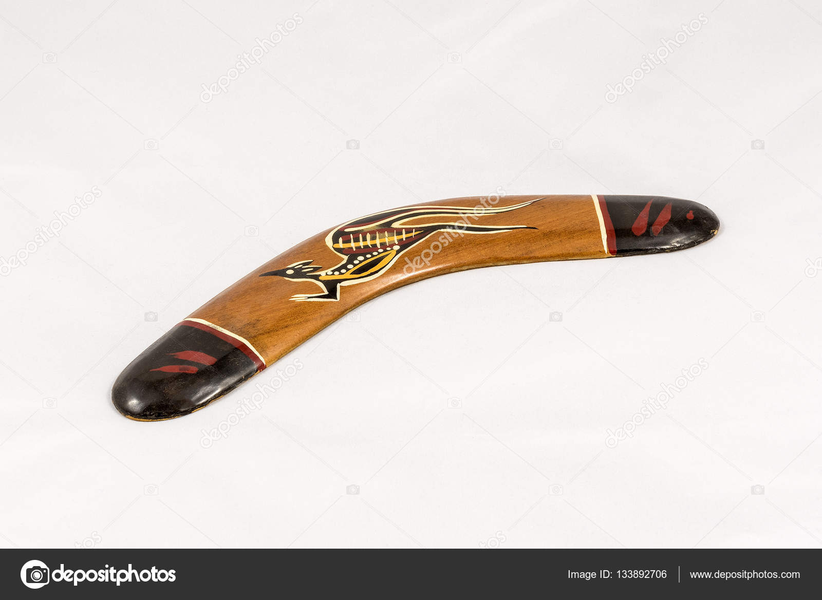 Brown wooden decorated australian boomerang — Stock Photo © marcorubino