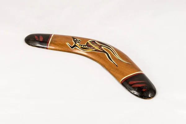 Brown wooden decorated australian boomerang — Stock Photo, Image