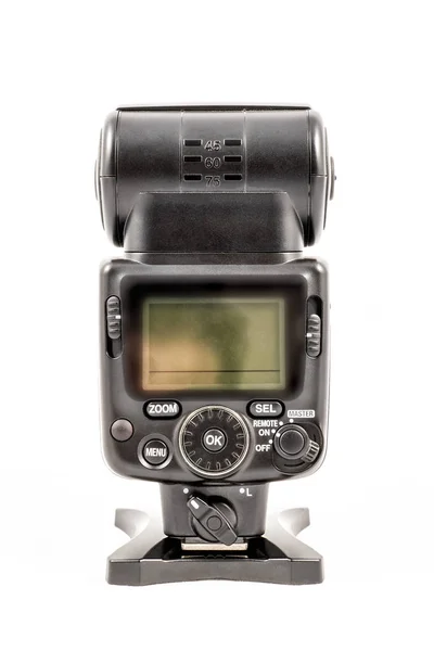 Unidad flash externa sin marca para cámara réflex digital — Foto de Stock