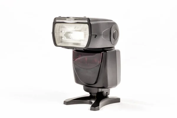 Unidad flash externa sin marca para cámara réflex digital — Foto de Stock
