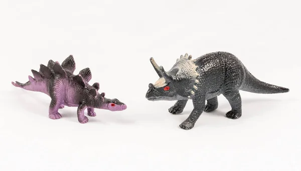 Stegosaurus and triceratops dinosaur toy models — Stock Photo, Image