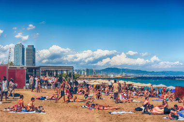 A sunny day on the Barceloneta beach, Barcelona, Catalonia, Spain clipart