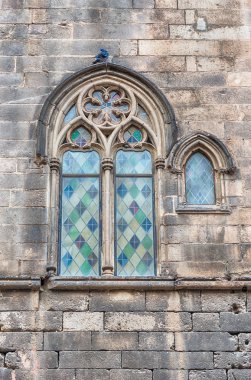 Medieval window in Placa del Rei, Barcelona, Catalonia, Spain