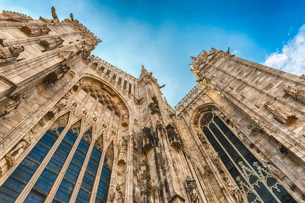 Spiers and statues on the gothic Cathedral of Milan, Italy