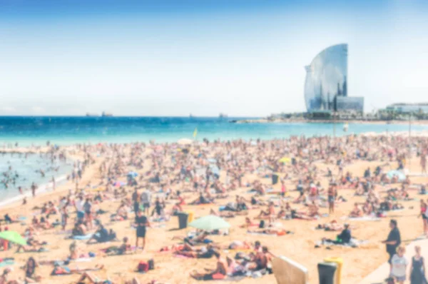 Fondo desenfocado de la playa de la Barceloneta, Barcelona, Cataluña, España — Foto de Stock