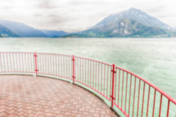 Fondo desenfocado con balcón sobre el Lago de Como, Italia — Foto de Stock