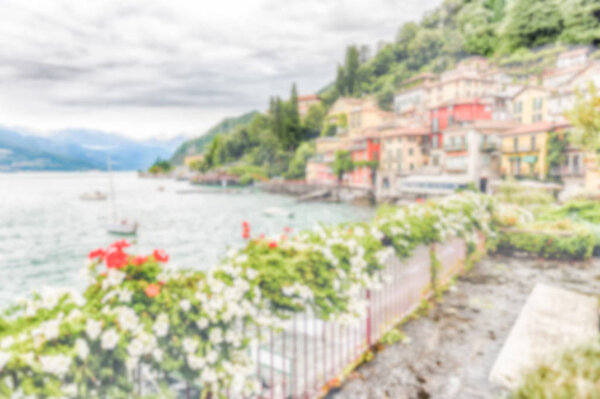Defocused background of the picturesque village of Varenna over the Lake Como, Italy. Intentionally blurred post production for bokeh effect