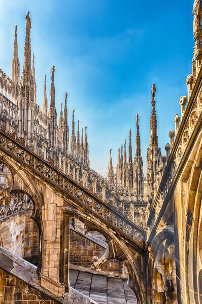 Spiers and statues on the gothic Cathedral of Milan, Italy