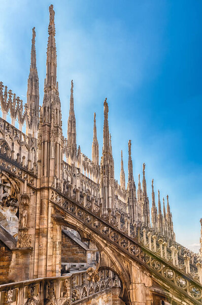 Spiers and statues on the gothic Cathedral of Milan, Italy