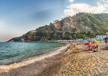 STALETTI', ITALY - JULY 27: Landscape with a scenic sandy beach of Copanello on the ionian coastline in Calabria, Italy, as of July 27, 2019 clipart