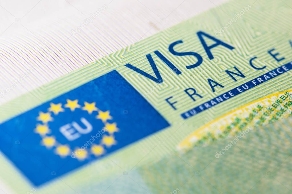 Schengen visa in the passport. This sample of the Schengen visa has been put into circulation since 2019. Selective focus.