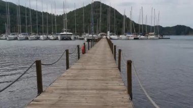 Orhaniye, Marmaris - Mugla / Turkey. Rüzgarlı bir günde iskelede bir yürüyüş..