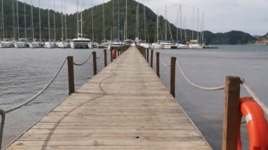 Orhaniye, Marmaris - Mugla / Turkey. Rüzgarlı bir günde iskelede bir yürüyüş..
