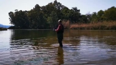 Hisaronu Orhaniye, Marmaris - Mugla / Türkiye. Hisaronu 'da nehirde bir balıkçı..
