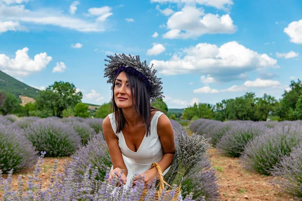 Turkey\'s lavender paradise: Kuyucak Village, Isparta - Turkey . Beautiful woman in the lavander field of the Kuyucak Isparta. Woman model is walking through lavender fields.