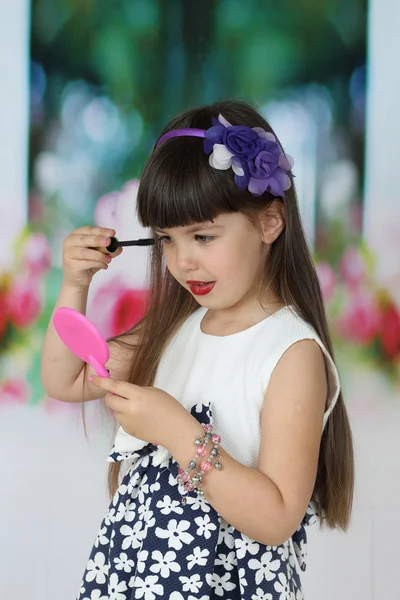 Little girl with mascara — Stock Photo, Image