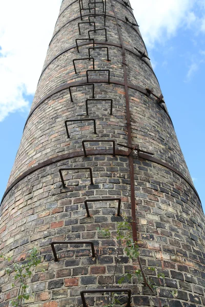 Factory chimney with ladder — Stock Photo, Image