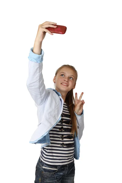 Tenåringsjente lager selfie – stockfoto