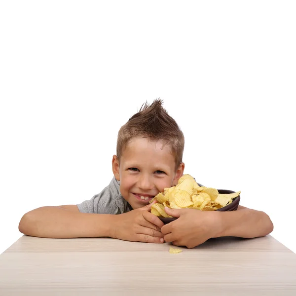 Boy with potatoes chips — Stock Photo, Image