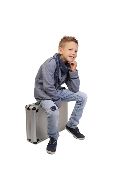 Boy sits on case — Φωτογραφία Αρχείου