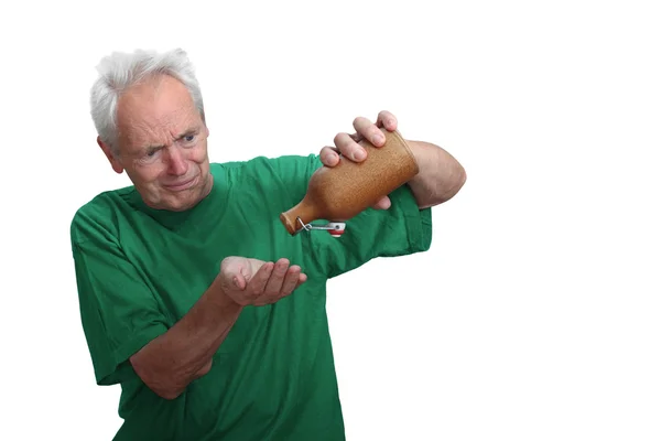 Senior man with empty bottle — ストック写真