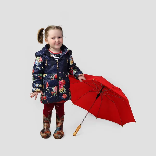 Happy little girl with red umbrella — Φωτογραφία Αρχείου