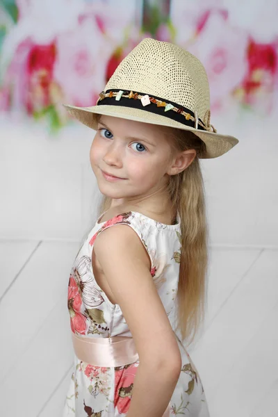 Cute little girl in hat — Stock Photo, Image