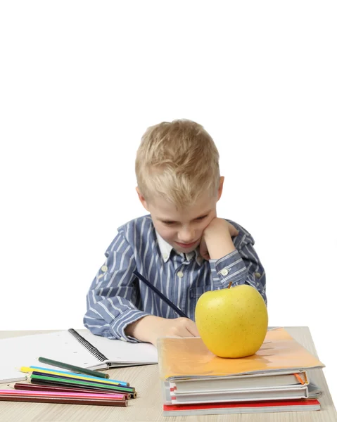 Schoolboy with focus on apple — Stock Photo, Image