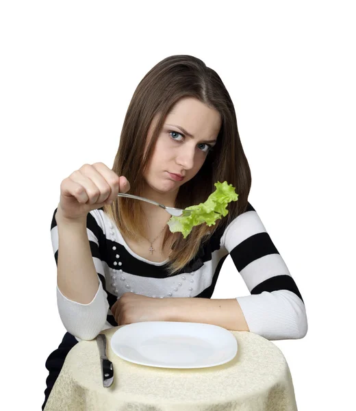 Young woman with lettuce leaf — Stock Photo, Image