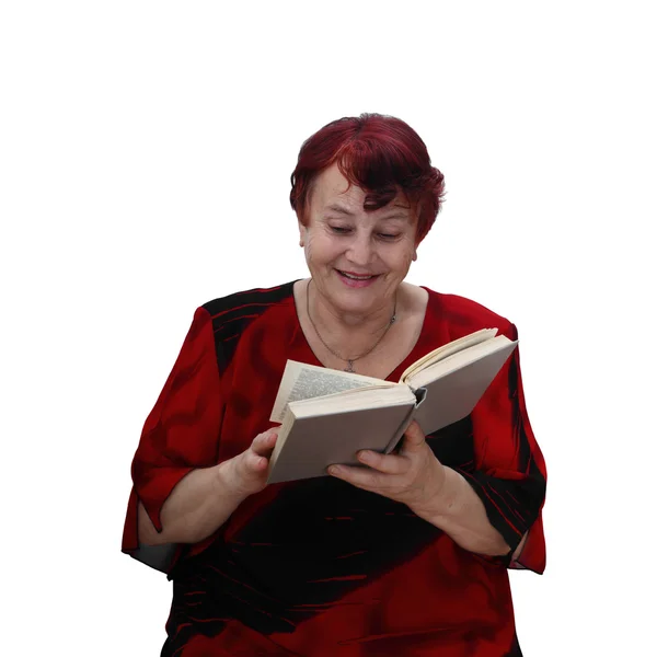 Cheerful senior woman reads book — Stock Photo, Image