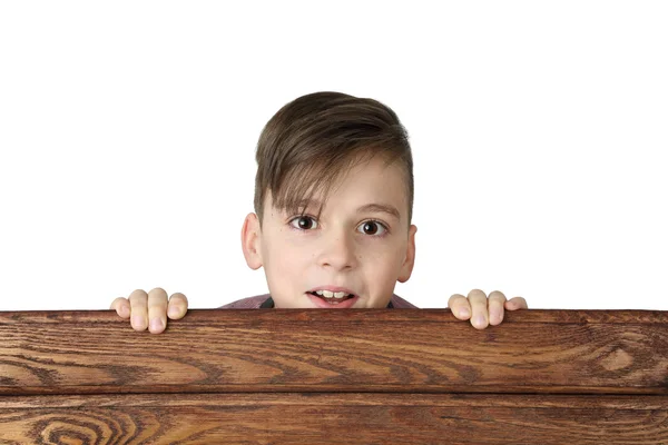 Boy look over fence — Stock Photo, Image