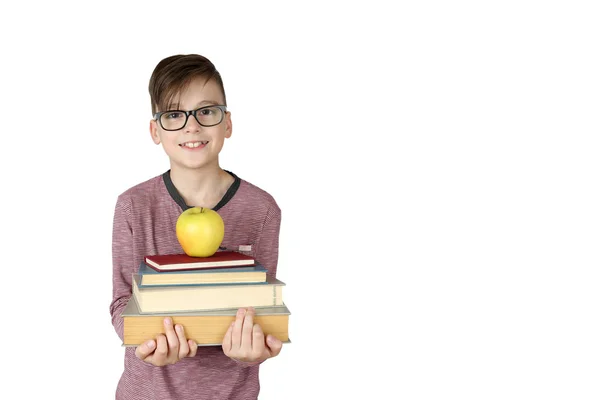 Boy holds stack of books — Stock Photo, Image