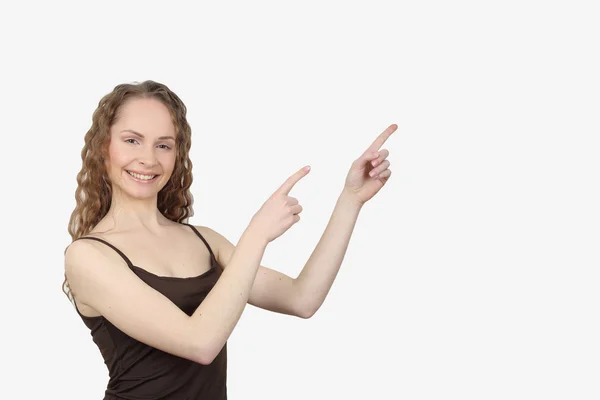 Young woman shows direction of hands — Stock Photo, Image