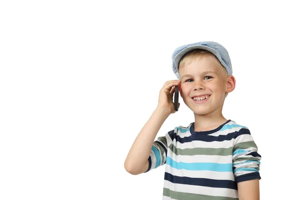 Menino fala por telefone celular — Fotografia de Stock