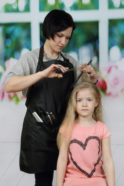 Brunette woman hairdresser