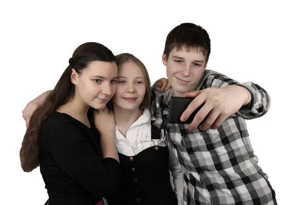 Cep telefonu ile üç genç — Stok fotoğraf